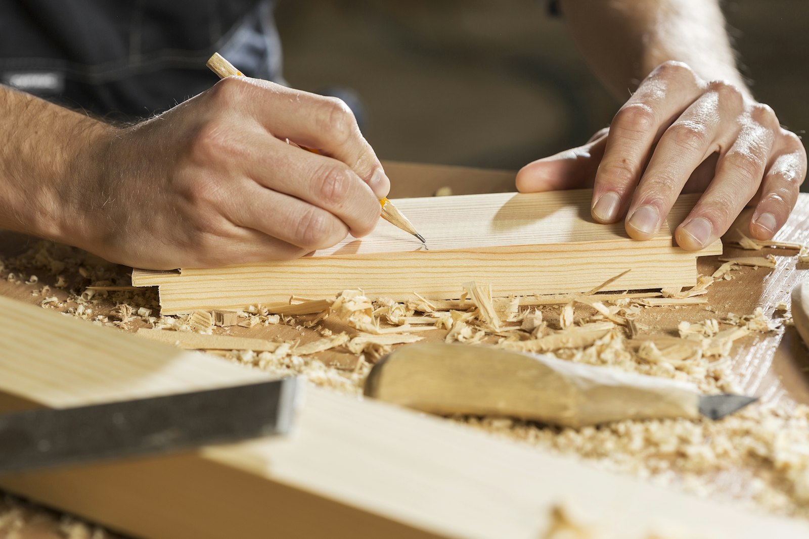 A craftsman's hands doing precise work
